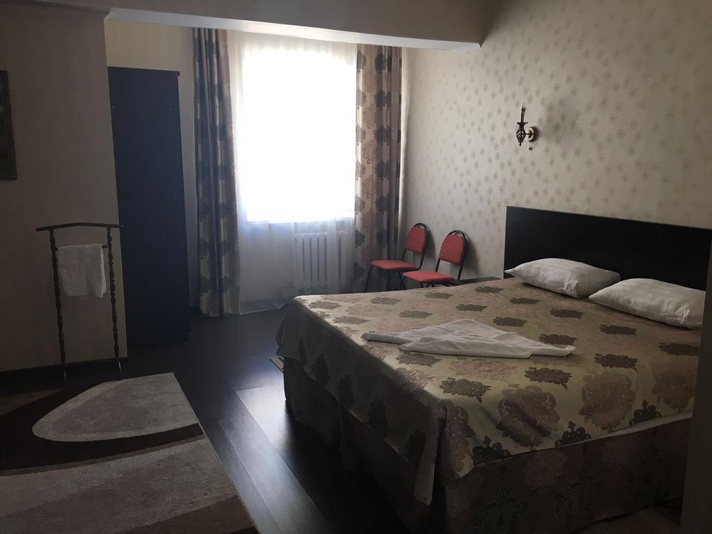 Home Hotel Astana Bagian luar foto
